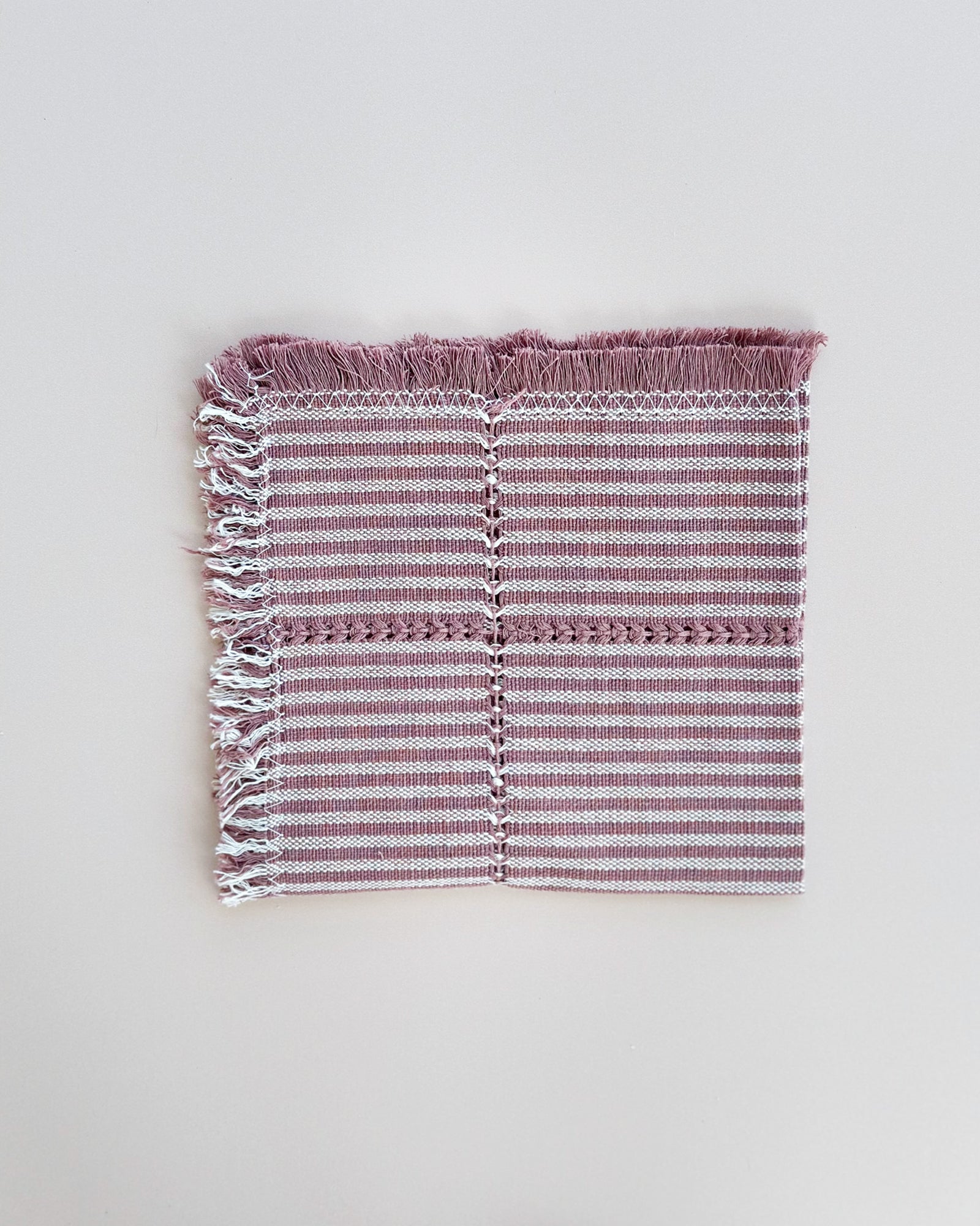 Romee Mulberry purple and cream dinner napkins